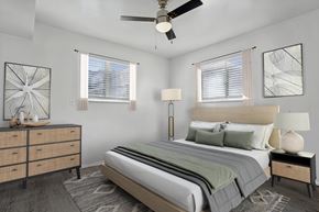 Ogden apartment for rent - A bedroom with a bed, nightstand, and a dresser.