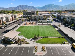 Midvale apartment for rent - an aerial view of a field in the middle of a parking lot