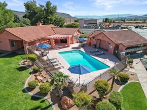 St. George apartment for rent - a birds eye view of a pool in front of a house
