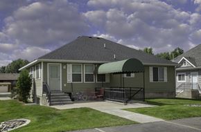Logan apartment for rent - a house with awning in front of a yard
