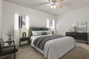 Provo apartment for rent - a bedroom with a bed and a ceiling fan