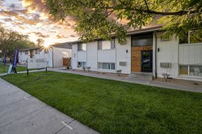 Salt Lake City apartment for rent - a building with a sign in front of it