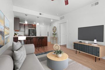 Salt Lake City apartment for rent - a living room with a couch and a tv