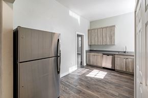 Clearfield apartment for rent - a kitchen with stainless steel appliances and wood flooring in a new home