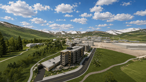 Park City townhouse for rent - A large building complex is surrounded by a green landscape and a road.