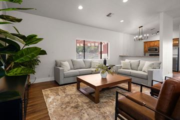 St. George apartment for rent - a living room with couches and a table