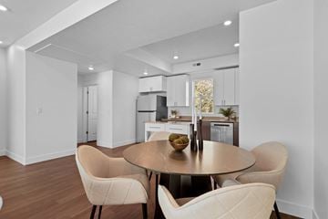 Clearfield townhouse for rent - a living room with a table and chairs and a kitchen
