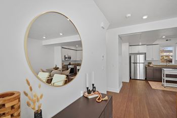 Distinctive wood-style flooring and plush carpeting