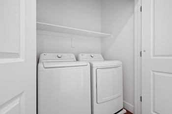 Full sized washer/ dryer included