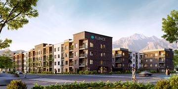 Ogden apartment for rent - A modern apartment complex named Fluence is surrounded by mountains.