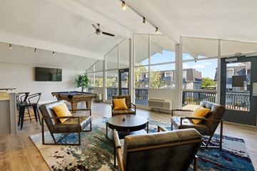 Salt Lake City apartment for rent - a living room with couches and chairs and a table