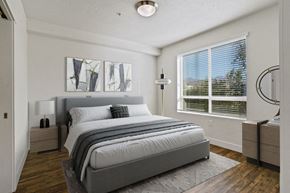 Salt Lake City apartment for rent - a bedroom with a bed and a window