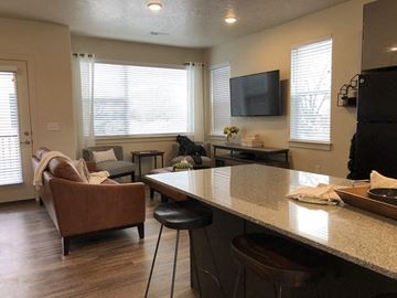 Midvale apartment for rent - a kitchen and living room with a table and chairs