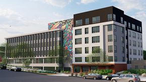 Salt Lake City apartment for rent - A modern building with a mural on the side.