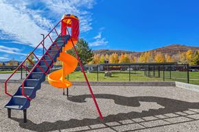 Park City apartment for rent - a slide on a playground in a park