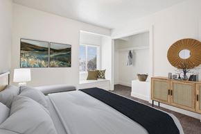 Tooele apartment for rent - a bedroom with a large bed and a window