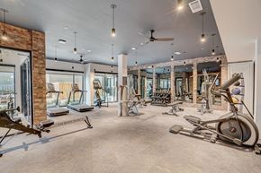 Lewisville apartment for rent - 24-hour fitness center at The Mill Old Town in Lewisville TX”