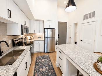 Designer kitchens with granite countertops & tile backsplash