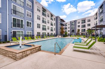 Two resort-style pools with sun decks — lounge, splash, repeat