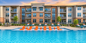 Celina apartment for rent - Resort-style swimming pool with in-water loungers and luxury apartment homes at One Preston Station in Celina, Texas.