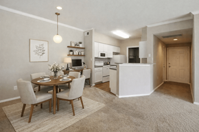Balch Springs apartment for rent - Open concept dining area and kitchen with wood flooring at Stoneleigh on Cartwright Apartments, Balch Springs, Texas