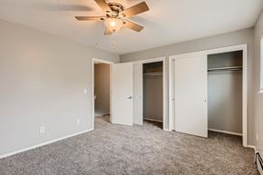 Loveland townhouse for rent - A bedroom with a large closet at Alder Square Townhomes Apartments