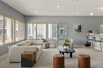 Clubhouse with couches and chairs at horizon east in aurora.