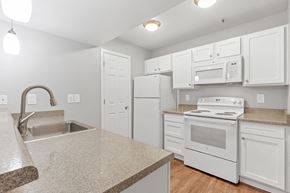 Loveland apartment for rent - A Kitchen at The Buttes Apartments, Loveland, CO 80537