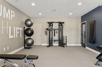 Fitness center with various gym equipment at horizon east.