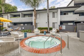 Canoga Park apartment for rent - Relaxation oasis: Dive into luxury at Cornerstone Apartments, where every dip in our updated pool and hot tub is a retreat under the palms.