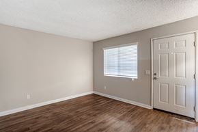 Poway apartment for rent - a bedroom with hardwood floors and a white door at Scripps Poway Villas, Poway, 92064