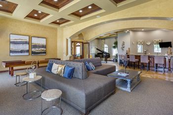 A living room with a couch and a table