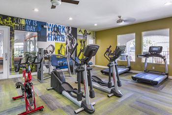 24-Hour fitness center with circuit and cardio equipment