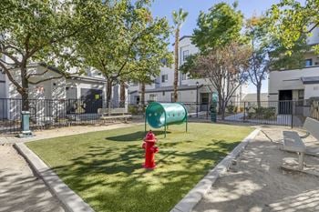 Dog owners can relax and enjoy the outdoors from strategically placed benches, offering a great view of the entire park.