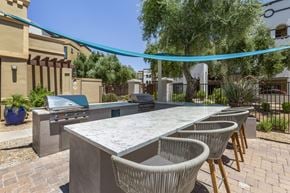 Chandler apartment for rent - Poolside BBQ area at Trevi Apartment Homes, Chandler, Arizona