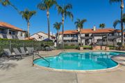 Moreno Valley apartment for rent - Sedona Apartments in Moreno Valley features a renovated pool deck with stylish lounge chairs—perfect for relaxing and soaking up the sun.