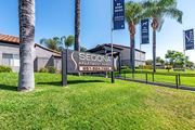 Moreno Valley apartment for rent - Sedona Apartments in Moreno Valley welcomes you with a modern, inviting entrance framed by lush landscaping and stylish, well-lit pathways.
