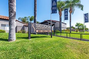 Moreno Valley apartment for rent - Sedona Apartments in Moreno Valley welcomes you with a modern, inviting entrance framed by lush landscaping and stylish, well-lit pathways.