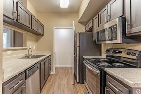 Riverside apartment for rent - This unit boasts a spacious, freshly renovated kitchen complete with sleek stainless steel appliances.at The Hills at Quail Run in Riverside, California
