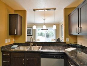 Novato apartment for rent - Chef inspired kitchen islands with chic pendant lighting at Crooked Oak at Loma Verde Preserve, Novato, 94949