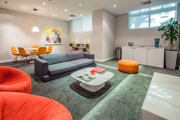 Los Angeles apartment for rent - a living room with a couch and a coffee table