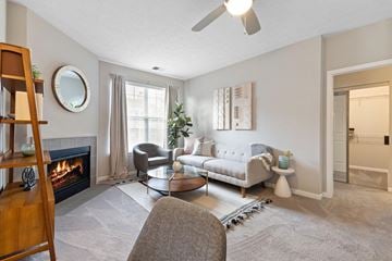 Fishers apartment for rent - a living room with a couch and a fireplace