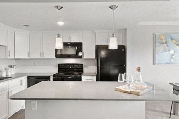 Kitchen with white cabinets