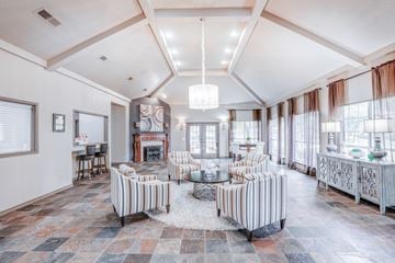 Dallas apartment for rent - a living room with furniture and a fireplace