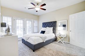 Dallas apartment for rent - Large bedroom with ceiling fan and ample natural light at Villas at Katy Trail Apartments, Dallas, 75201