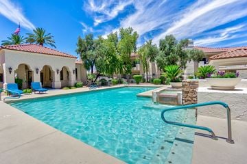 Scottsdale apartment for rent - A pool with a ladder in the middle of it.