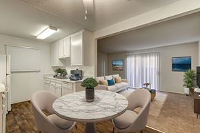 Escondido apartment for rent - A dining room with a round marble table and chairs.