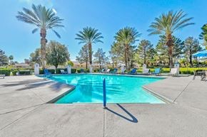 Las Vegas apartment for rent - Outdoor swimming pool with palm trees at Country Club at The Meadows, Nevada