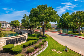 Frisco apartment for rent - A sunny day at the Cypress Estates community with a clear blue sky.
