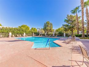 Las Vegas apartment for rent - Heated pool deck with palm trees surrounding at Country Club at Valley View - 55+ Senior Community Apartments, Las Vegas, NV